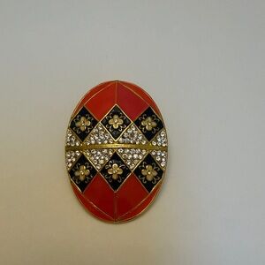 Red and Black Oval Brooch with Gold Accents